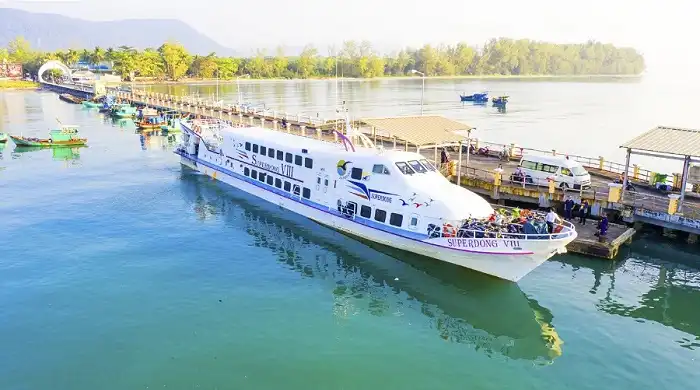Ferry to Phu Quoc crossing calm sea waters with island views in the distance.